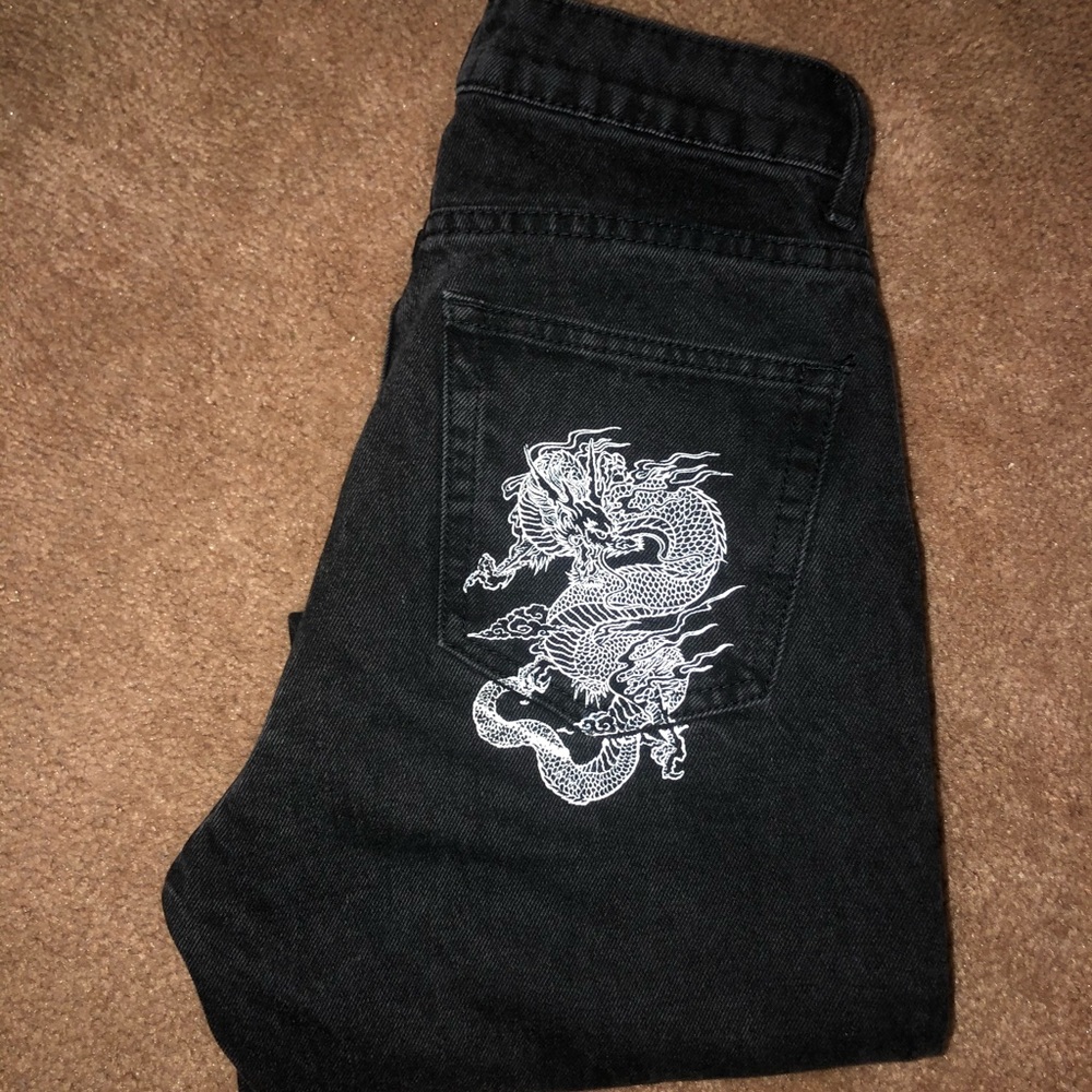 Black mom jeans with snake pocket detailing.